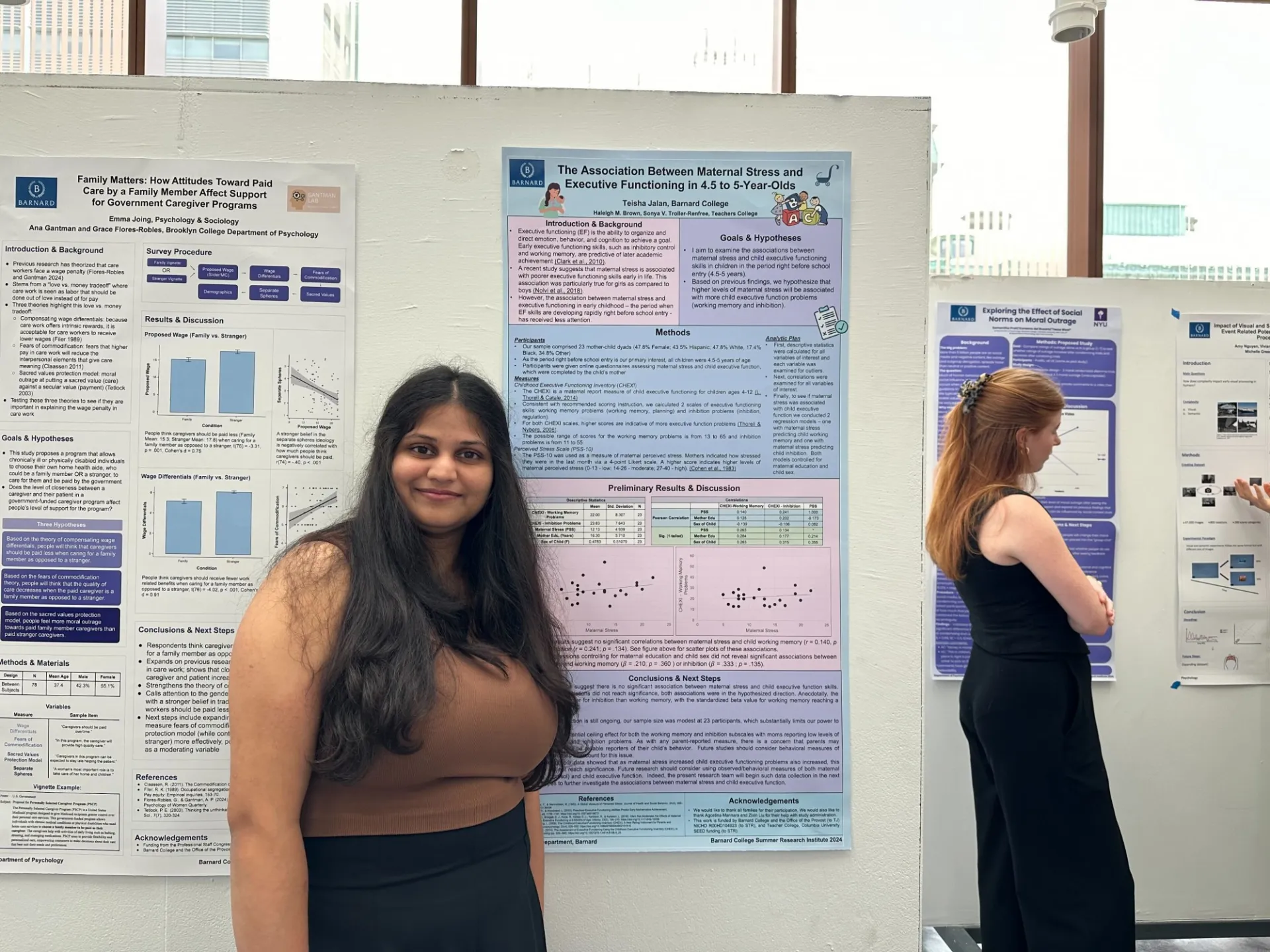 Teisha Jalan in front of her poster.